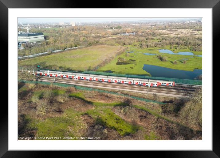 London Underground Train Passing From The Air  Framed Mounted Print by David Pyatt