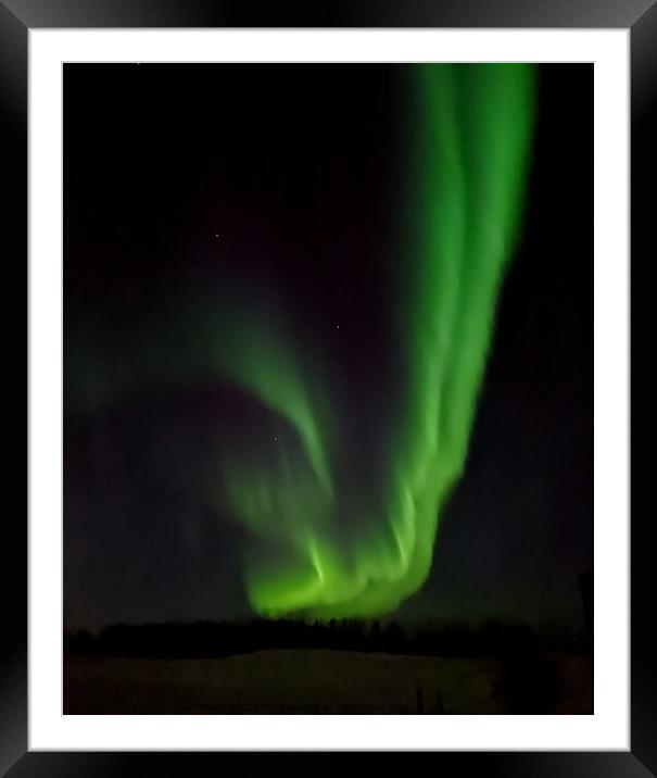 Northern Lights or Aurora Borealis resembling a green fishhook  Framed Mounted Print by Robert Galvin-Oliphant