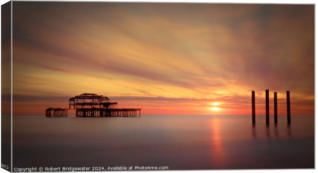 Sunset at Brighton West Pier Canvas Print by Robert Bridgewater