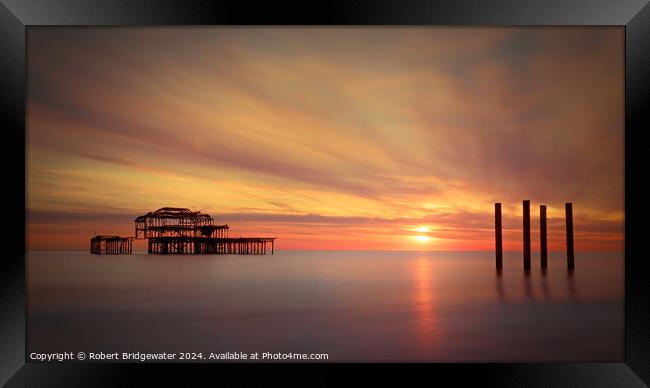Sunset at Brighton West Pier Framed Print by Robert Bridgewater
