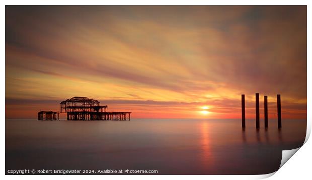Sunset at Brighton West Pier Print by Robert Bridgewater