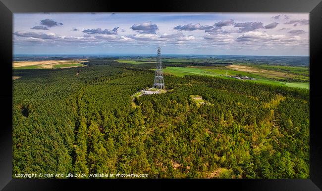 Metal Tower Amidst Forest Aerial View in North Yorkshire Framed Print by Man And Life