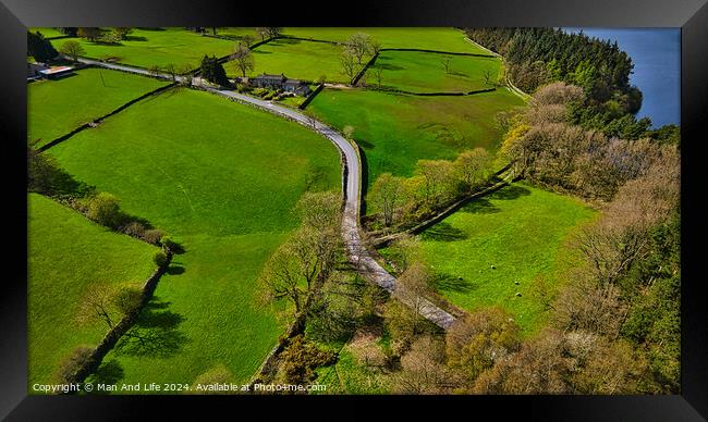 Aerial View of Green Landscape and Winding Road in North Yorkshire Framed Print by Man And Life