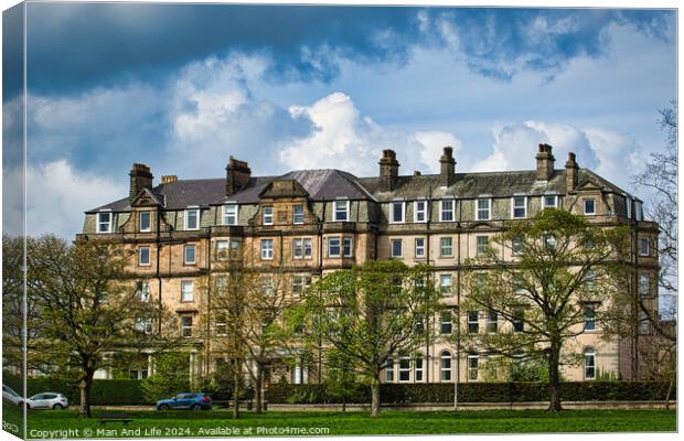 Historic Stone Apartments Under Cloudy Sky in Harrogate ,North Yorkshire Canvas Print by Man And Life