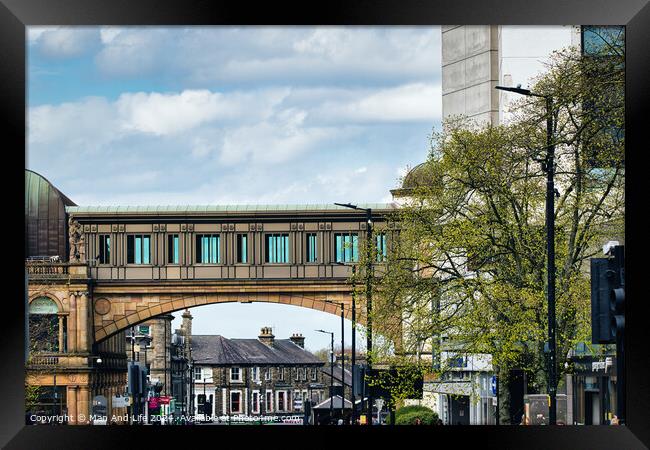 Urban Blend: Train Over Pedestrian Bridge in Harrogate, North Yorkshire Framed Print by Man And Life