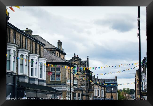 Festive Town Street View in Harrogate, North Yorkshire Framed Print by Man And Life