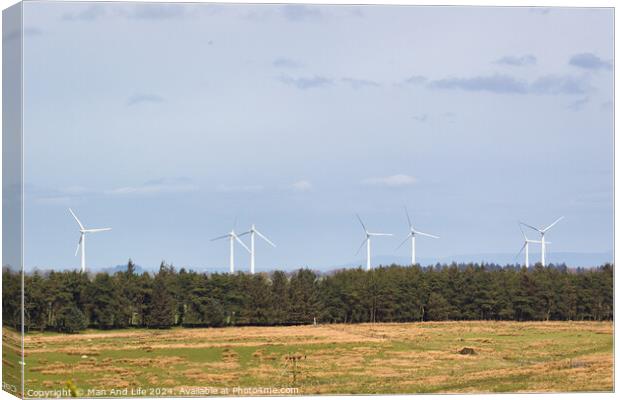 Wind Turbines in Countryside Canvas Print by Man And Life