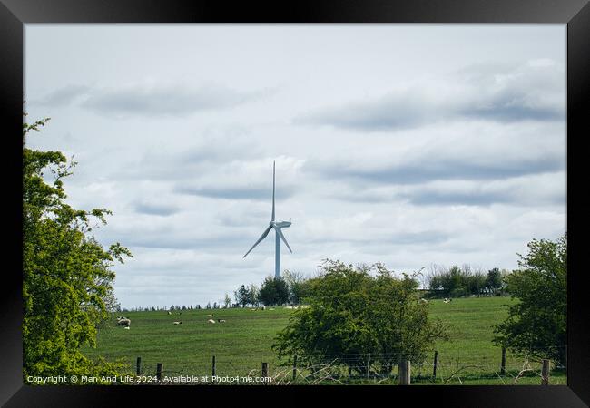 Wind Turbine in Pastoral Setting Framed Print by Man And Life