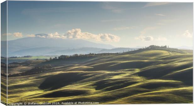 Landscape in Tuscany with farmhouse and rolling hills Canvas Print by Stefano Orazzini
