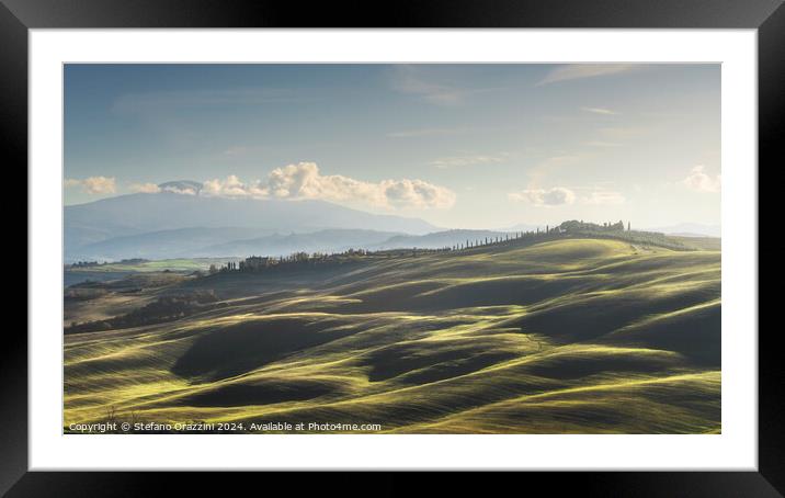 Landscape in Tuscany with farmhouse and rolling hills Framed Mounted Print by Stefano Orazzini