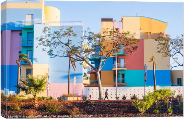 Colorful buildings photographed from the street in Canvas Print by Laurent Renault