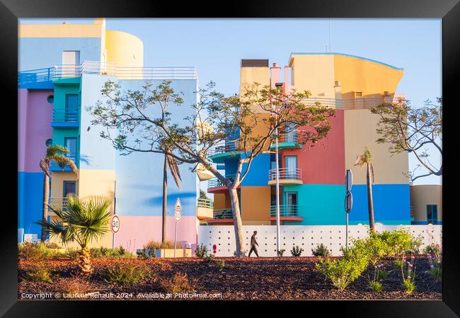 Colorful buildings photographed from the street in Framed Print by Laurent Renault