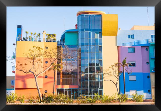 Colorful facades of modern buildings in Marina  port of Albufeir Framed Print by Laurent Renault