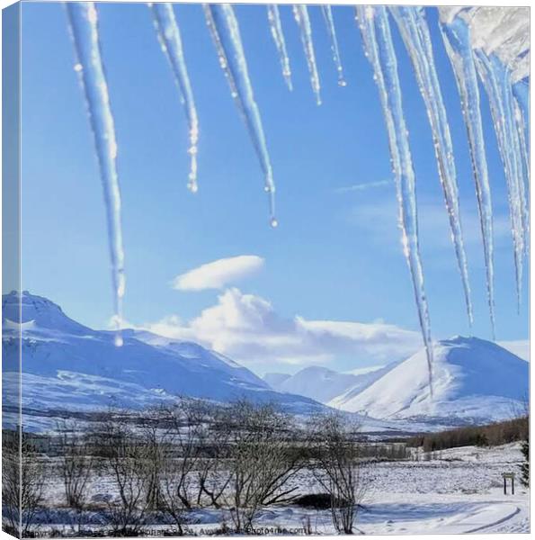 Icicles and snowy landscape  Canvas Print by Robert Galvin-Oliphant