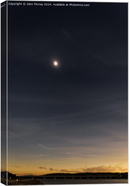 Totality above the landscape Canvas Print by John Finney