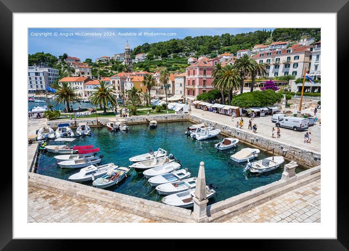 Marina on waterfront of Hvar Town, Croatia Framed Mounted Print by Angus McComiskey