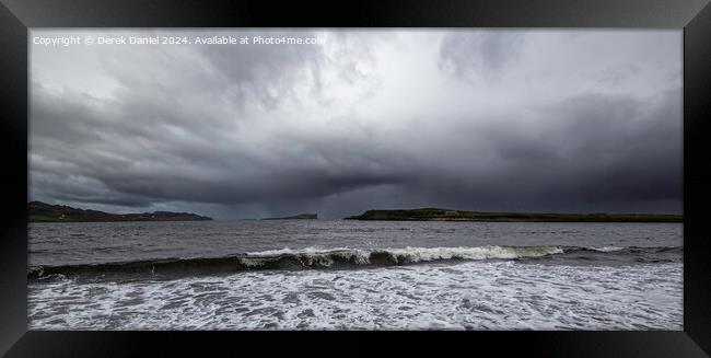 Majestic storm brewing over Staffin Bay Framed Print by Derek Daniel