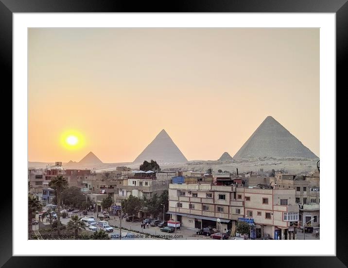 Setting sun at the pyramids of Giza Framed Mounted Print by Robert Galvin-Oliphant