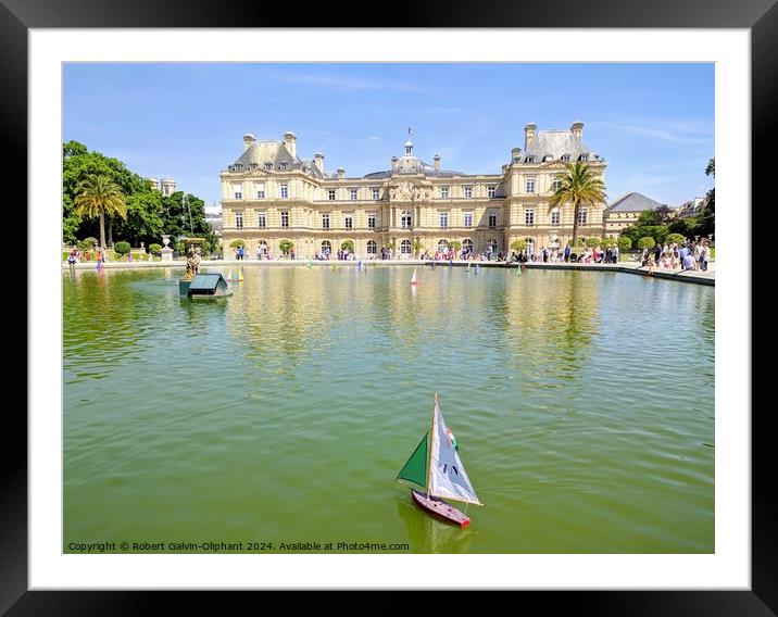 A toy sailboat in the Luxembourg Garden pond, Pari Framed Mounted Print by Robert Galvin-Oliphant