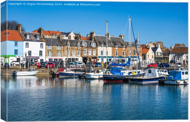Boats moored in Anstruther harbour in Fife Canvas Print by Angus McComiskey