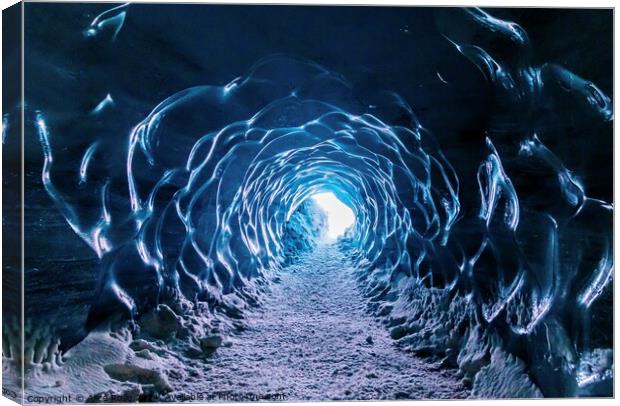 Glacial Ice Cave Tunnel in Iceland Canvas Print by Alice Rose Lenton
