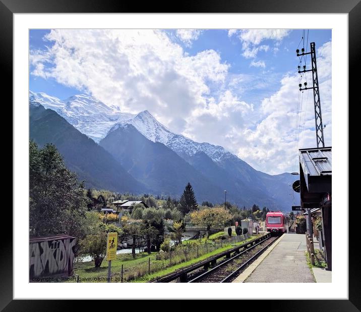 Train approaching alpine station Framed Mounted Print by Robert Galvin-Oliphant