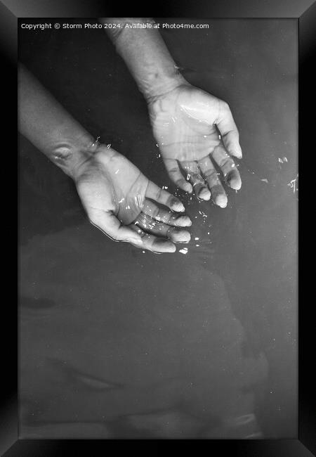 Monochrome hands in water Framed Print by Storm Photo