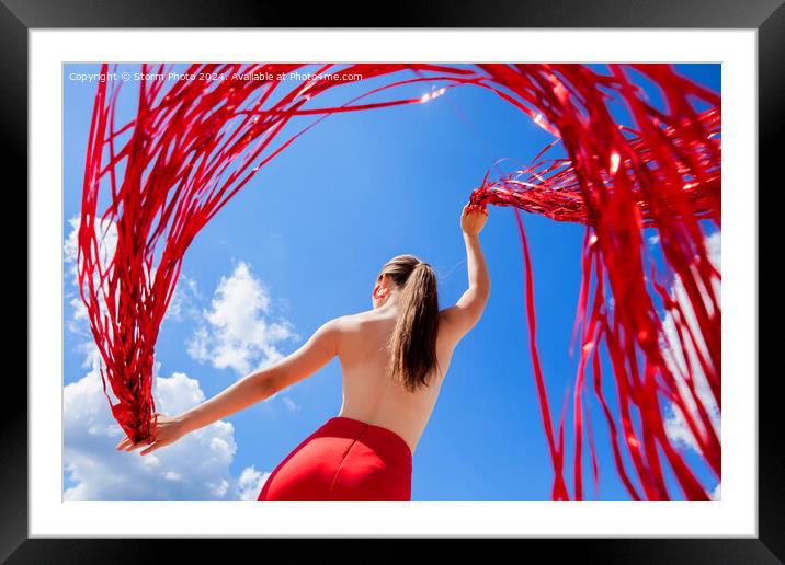 Red serpentine dance Framed Mounted Print by Storm Photo