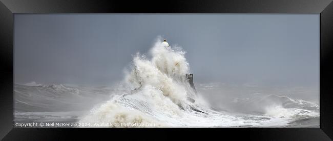 Stormy lighthouse  Framed Print by Neil McKenzie
