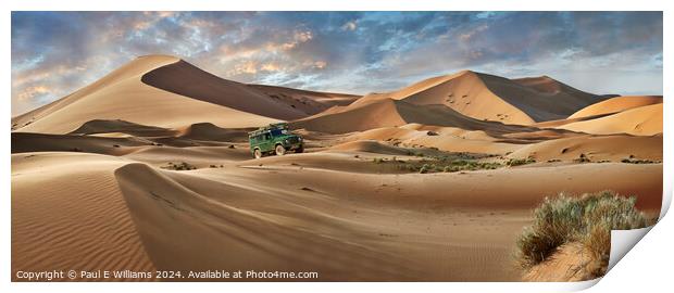 Defender Crossing the Erg Chebbi Sand Dunes, Sahara, Morocco. Print by Paul E Williams