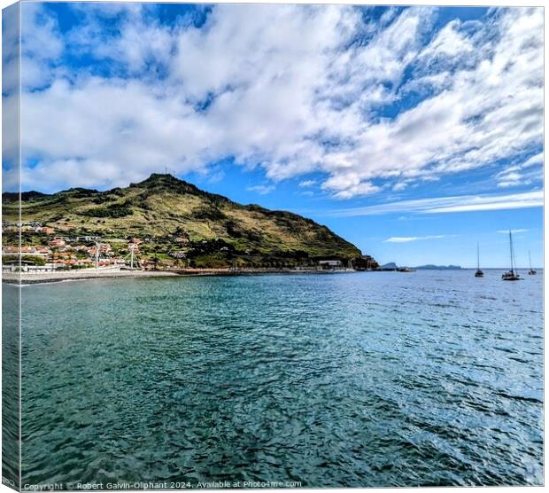 Clouds over Machico bay, Madeira Canvas Print by Robert Galvin-Oliphant