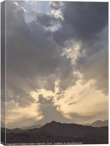 Dramatic sunset clouds over mountains  Canvas Print by Robert Galvin-Oliphant