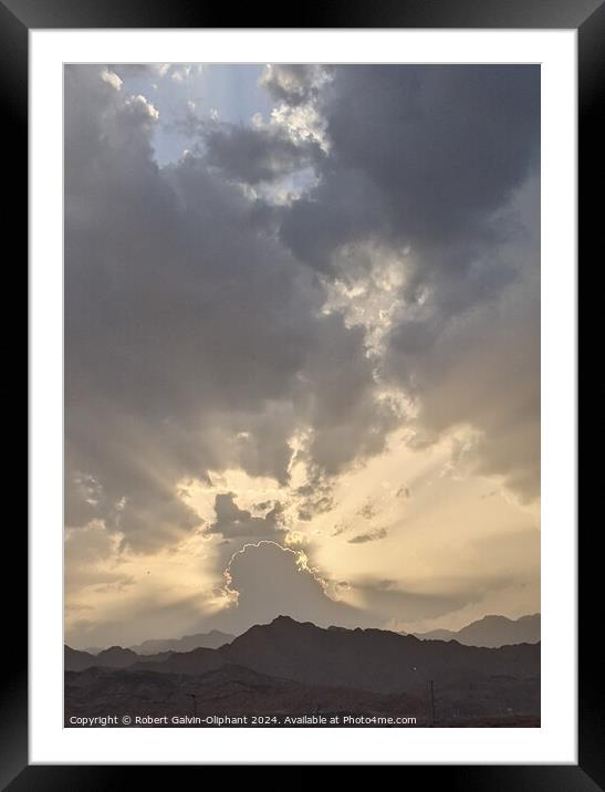 Dramatic sunset clouds over mountains  Framed Mounted Print by Robert Galvin-Oliphant