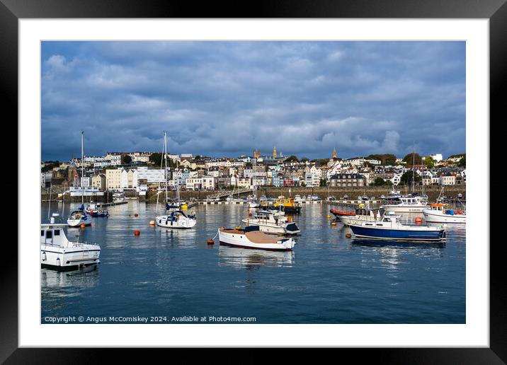 St Peter Port harbour in Guernsey, Channel Islands Framed Mounted Print by Angus McComiskey