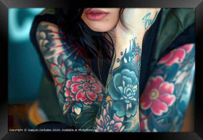 Young woman showcases colorful tattoos on her arms, standing confidently. Framed Print by Joaquin Corbalan