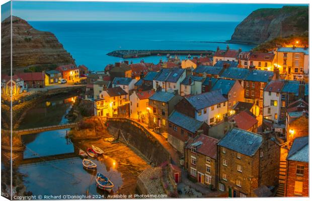 Staithes village at dusk Canvas Print by Richard O'Donoghue