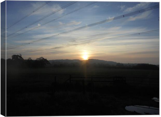 Sunrise over Rivey Hill Canvas Print by Simon Hill