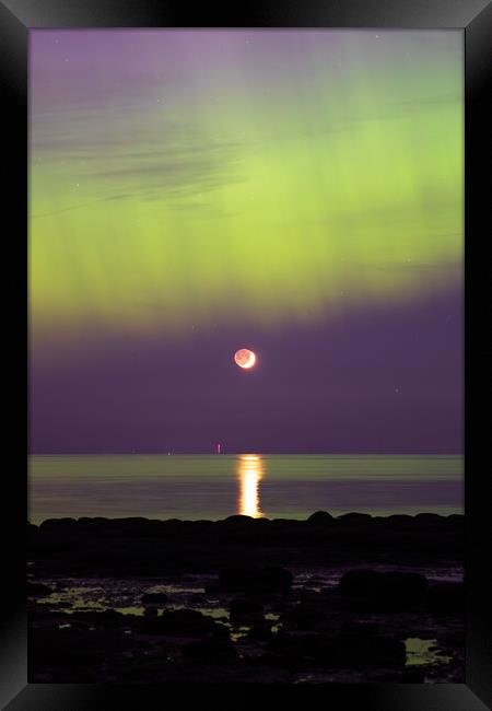 The Northern lights over the moon in Hunstanton Framed Print by Bryn Ditheridge