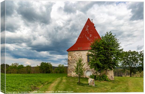 Old church in the summer field. Canvas Print by Sergey Fedoskin