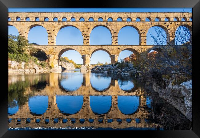 The Pont du Gard. Ancient Roman aqueduct bridge over Gardon rive Framed Print by Laurent Renault
