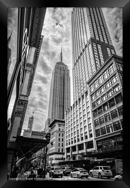 The Iconic Empire State Building Framed Print by Roger Dutton