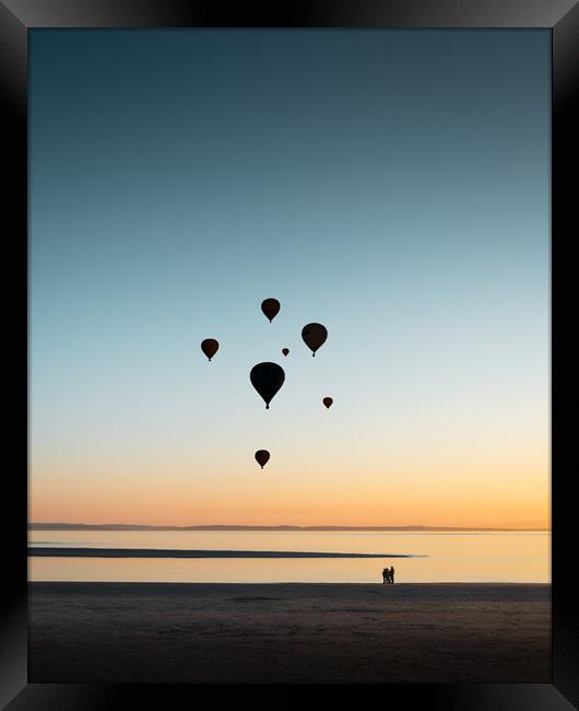 Balloons at Sunset Framed Print by Mark Jones