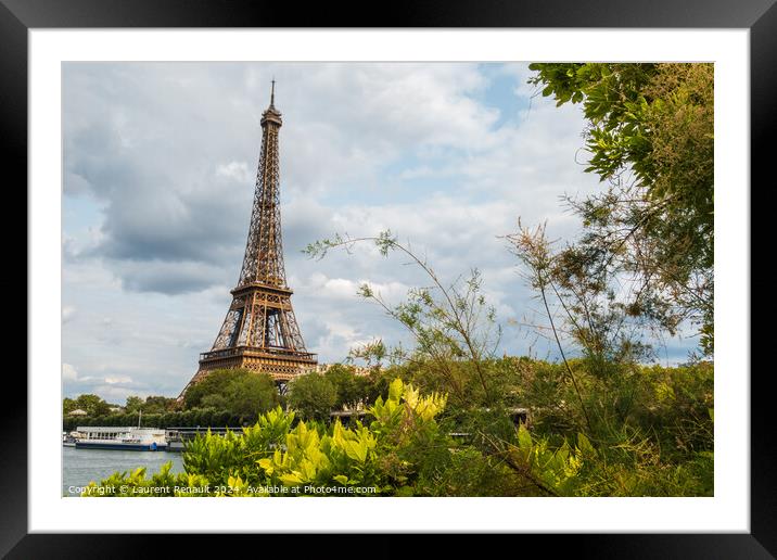 Eiffel Tower viewed from the banks with frame of vegetation Framed Mounted Print by Laurent Renault