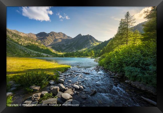 Trees and rocks along the shores of Lake Arpy. Aosta Valley Framed Print by Stefano Orazzini