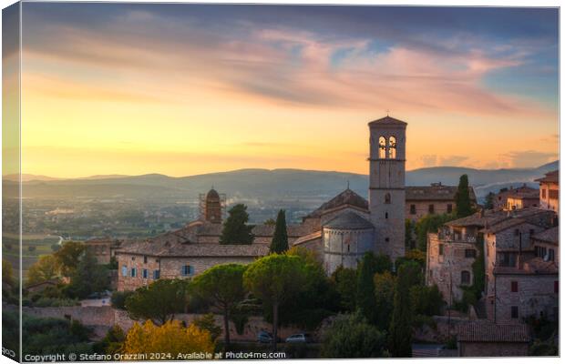 Assisi town at sunset. Perugia, Umbria, Italy. Canvas Print by Stefano Orazzini