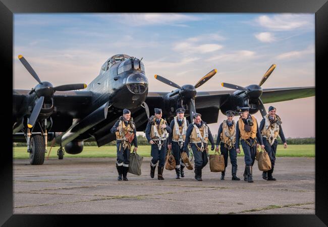 Lancaster Bomber Crew Return Framed Print by J Biggadike