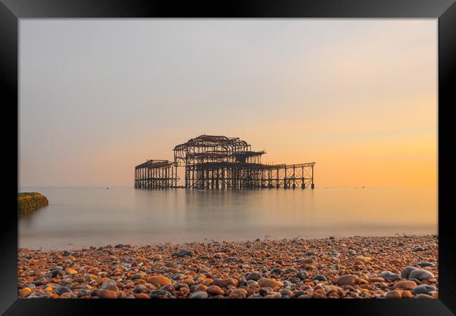 Brighton West Pier at sunset Framed Print by Andrew Scott