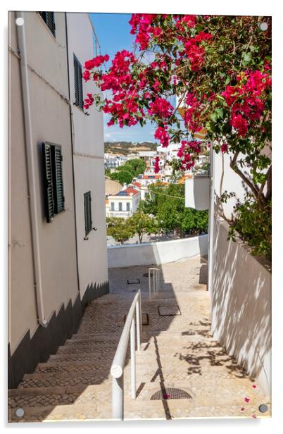 Steep street with Bougainvillea flowers, Albufeira, Portugal Acrylic by Kevin Hellon