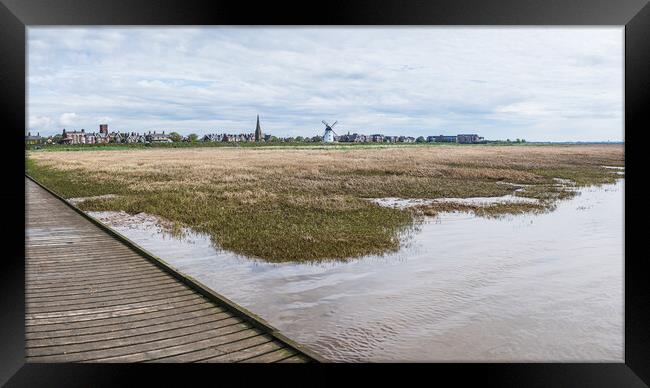 Lytham seafront over the jetty and marshes Framed Print by Jason Wells