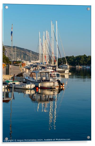 Boats moored in Stari Grad harbour, Croatia Acrylic by Angus McComiskey